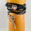 Thumbnail: Leather wrap bracelet with scissor and heart charms