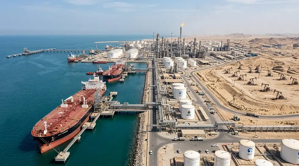 Oil tankers docked at a Gulf port beside refineries and pumping jacks.