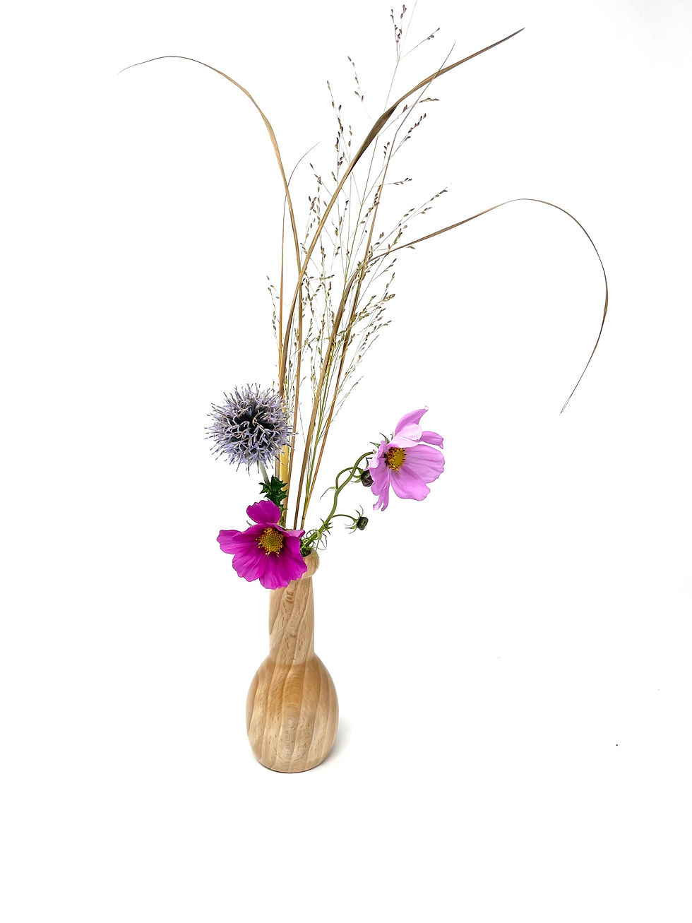 Thumbnail: Bulb shaped bud vases with colourful flowers, handmade from wood