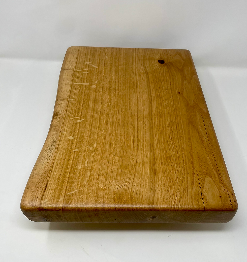 Thumbnail: Chunky oak waney edge chopping board made from quarter sawn oak