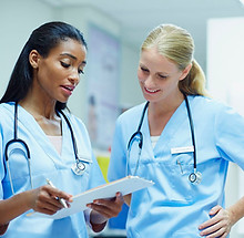 nurses-discussing-over-documents-in-hospital-493216353-595690893df78c4eb647536e-5bd78e3446