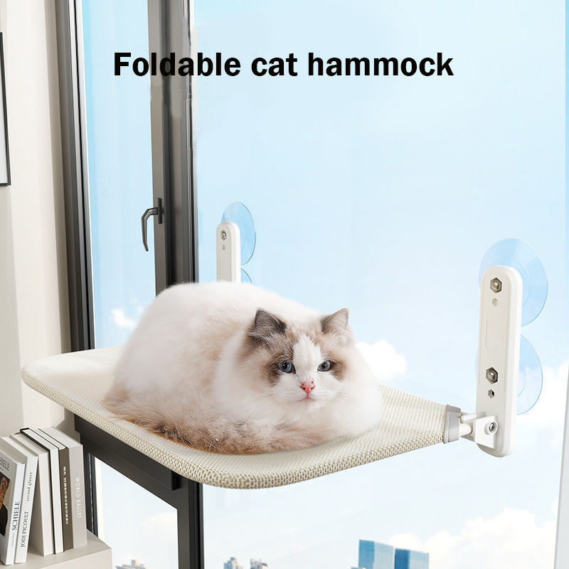 Cat relaxing on the AnMélie Window Cat Hammock