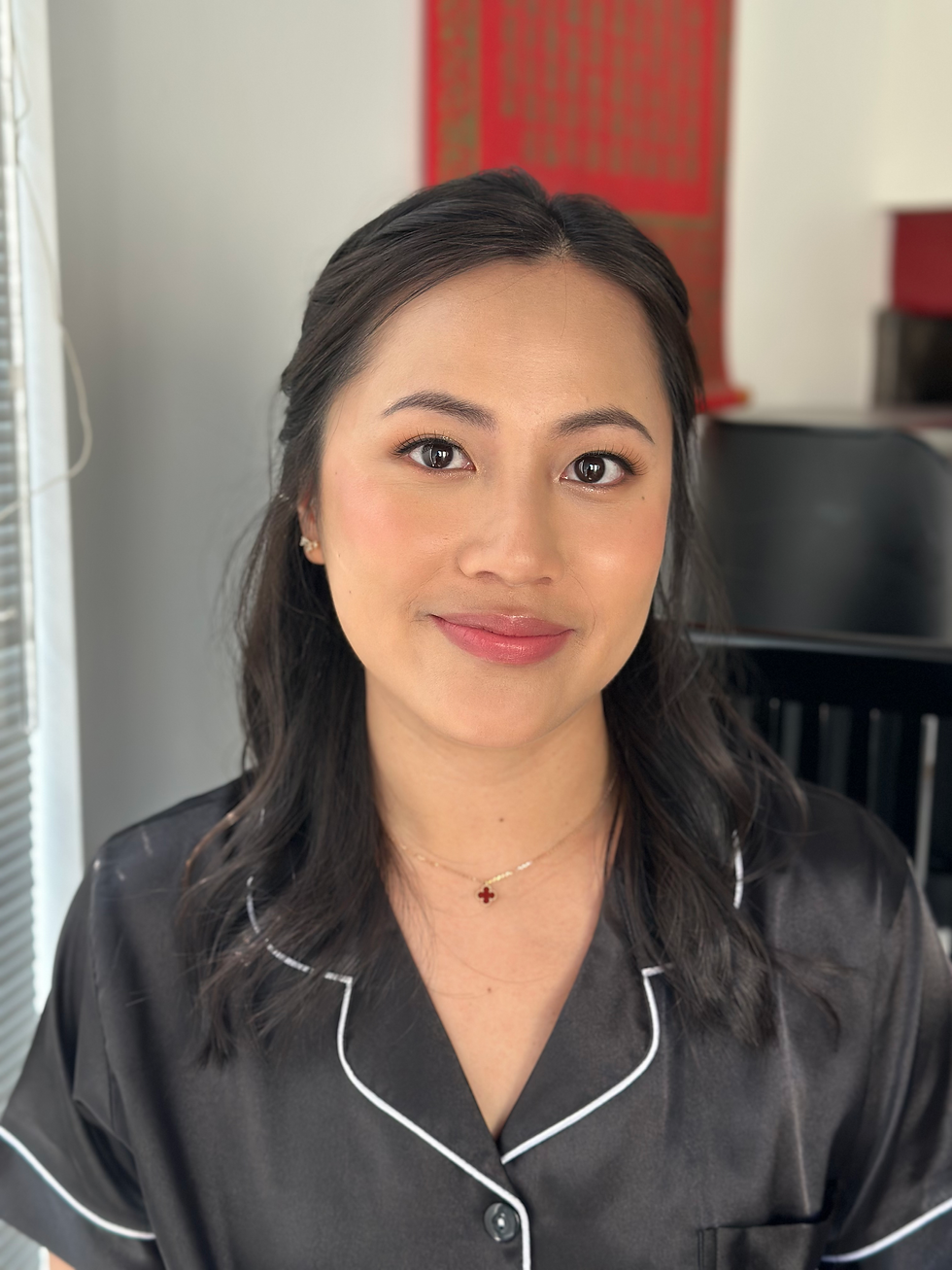 Close-up view of bridesmaid makeup with glowing skin and soft pink lips