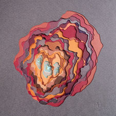 rust colored abstract sculpture