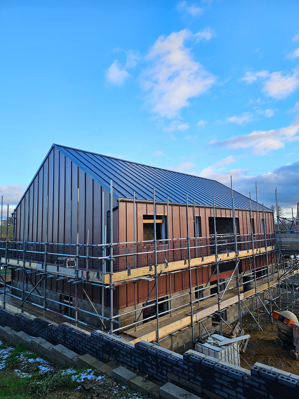 vm zinc pigmento red cladding and pigmento grey zinc roof/rainwater goods