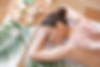 Young woman receiving back scrub massage in spa salon.jpg