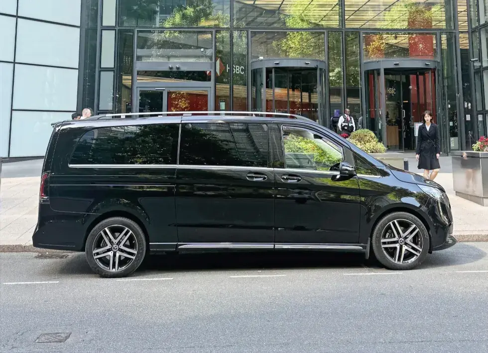 V class Mercedes waiting for clients outside HSBC canary wharf