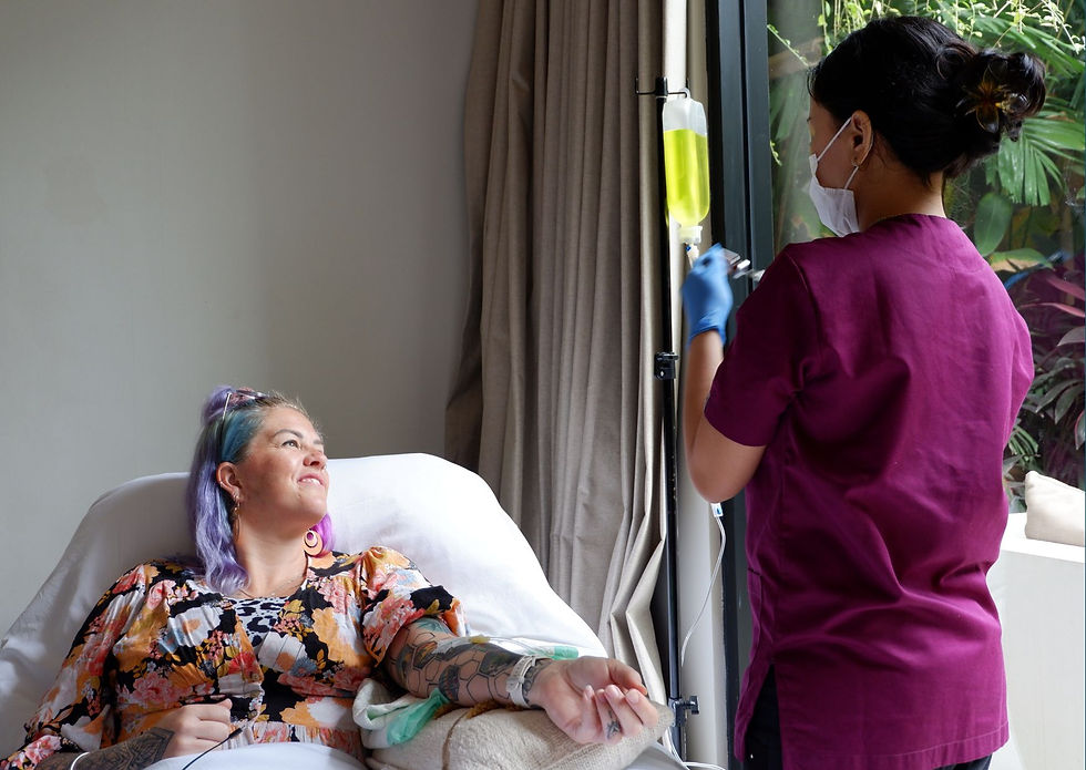 bali luxe guest enjoying IV treatment with nurse