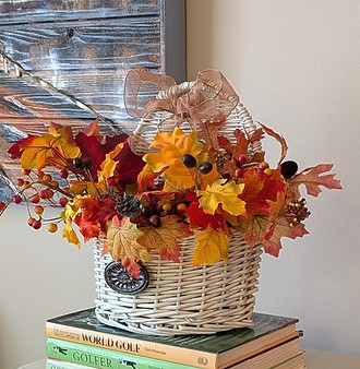 white wicker basket with Fall Decor - 2 - on golf books.jpg
