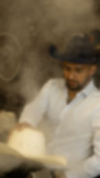 Alex Torres custom creating a hat.