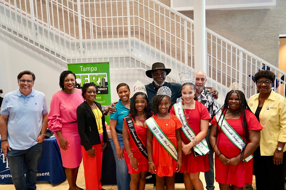 Local leaders and Ms. and Little Ms. Juneteenth pageant participants pose with Benjamin Haith (third from back left), designer of the national Juneteenth Flag, at the event. (Photo courtesy of the City of Tampa)