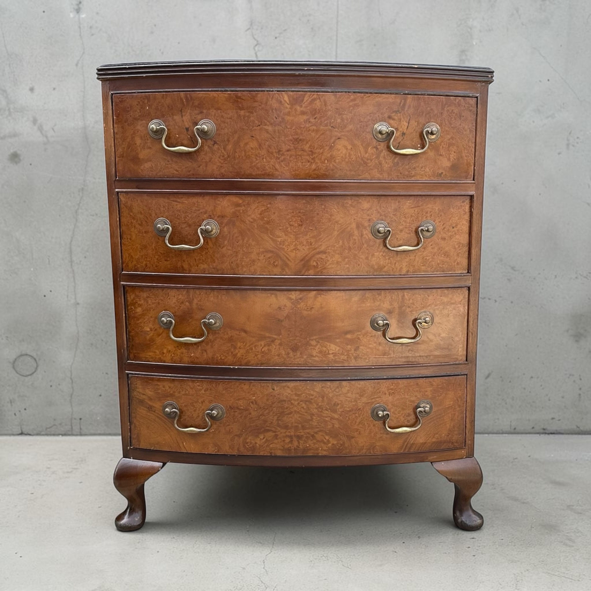 Antique style Walnut bow front chest of drawers