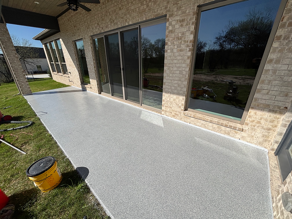 Outdoor patio finished by epoxy flooring contractors.