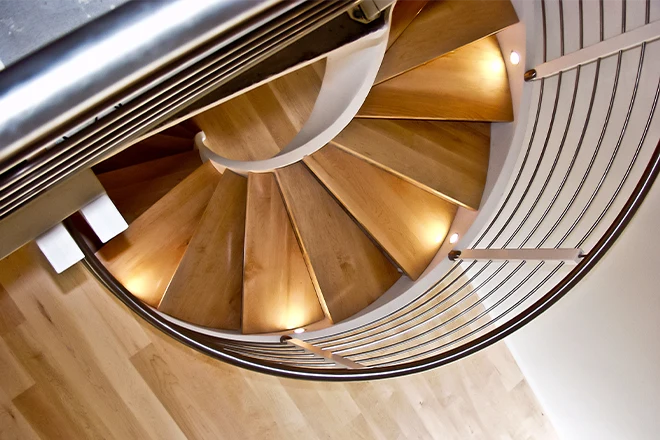 Top down view of spiral stairs with step lights