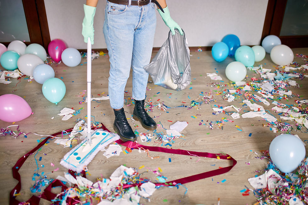 woman-with-pushbroom-cleaning-mess-floor-room-after-party-confetti.jpg
