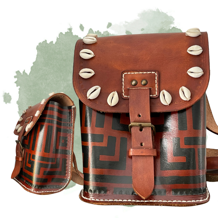 Cowrie shell embellished leather bag