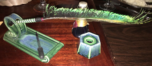 Green and blue quill pen and inkwell; let's write!