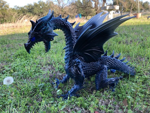 Jamie the blue dragon about to sneeze fire due to a dandelion allergy