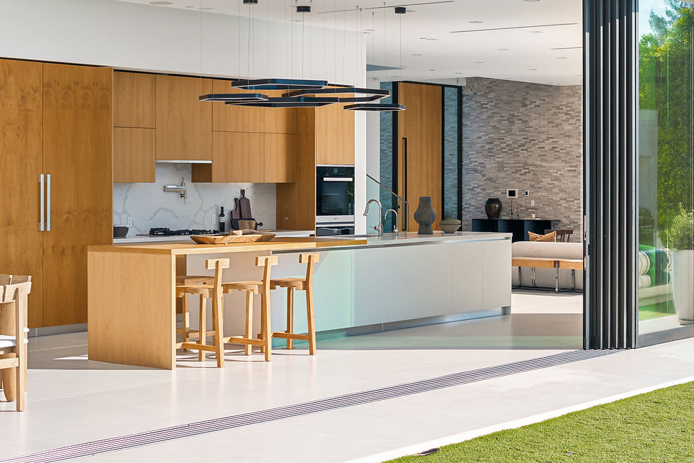 modern-kitchen-with-an-island-table-and-bar-stools-2026-03-18-05-39-34-utc.jpg