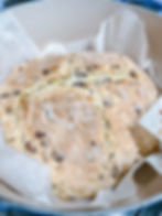 Irish soda bread in a blue le crueset dutch oven for the catholic feast of st patrick