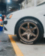 New set of sporty Michelin summer tires installed on a Mitsubishi sports car