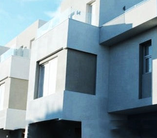 Facciata della villa tipo AB nel complesso Larimar Villas a Port Ghalib