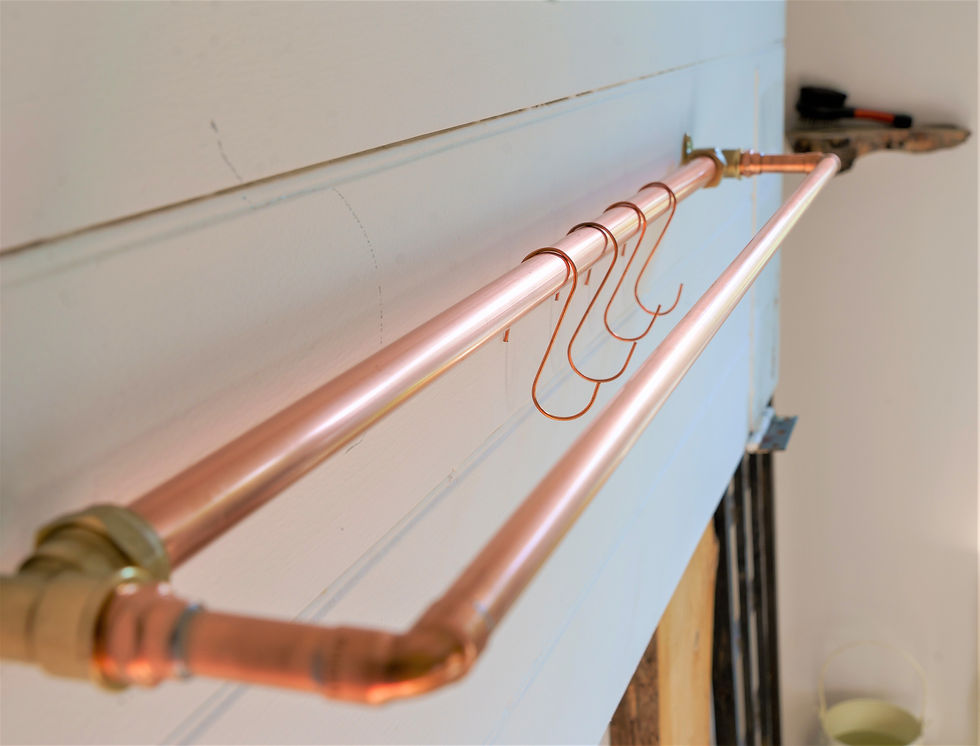 Thumbnail: Copper pipe shelving with hooks