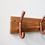 Thumbnail: Copper pipe coat hooks on wood