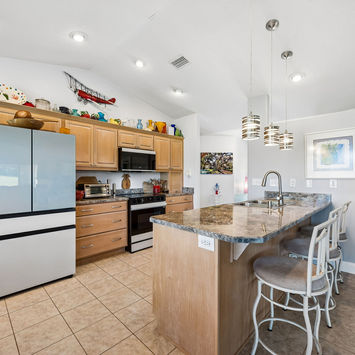 Kitchen with eating area at counter - 107 Eagles Nest Lane Crescent City, FL 32112