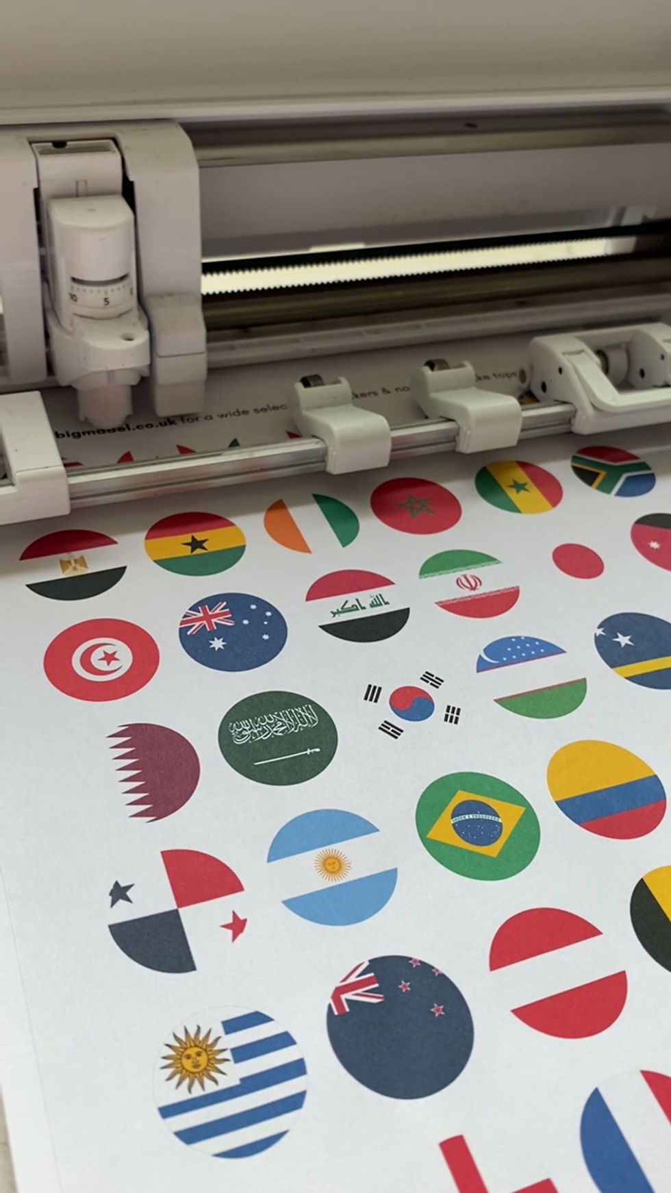 Thumbnail: Video showing flag stickers being cut out on a Silhouette machine