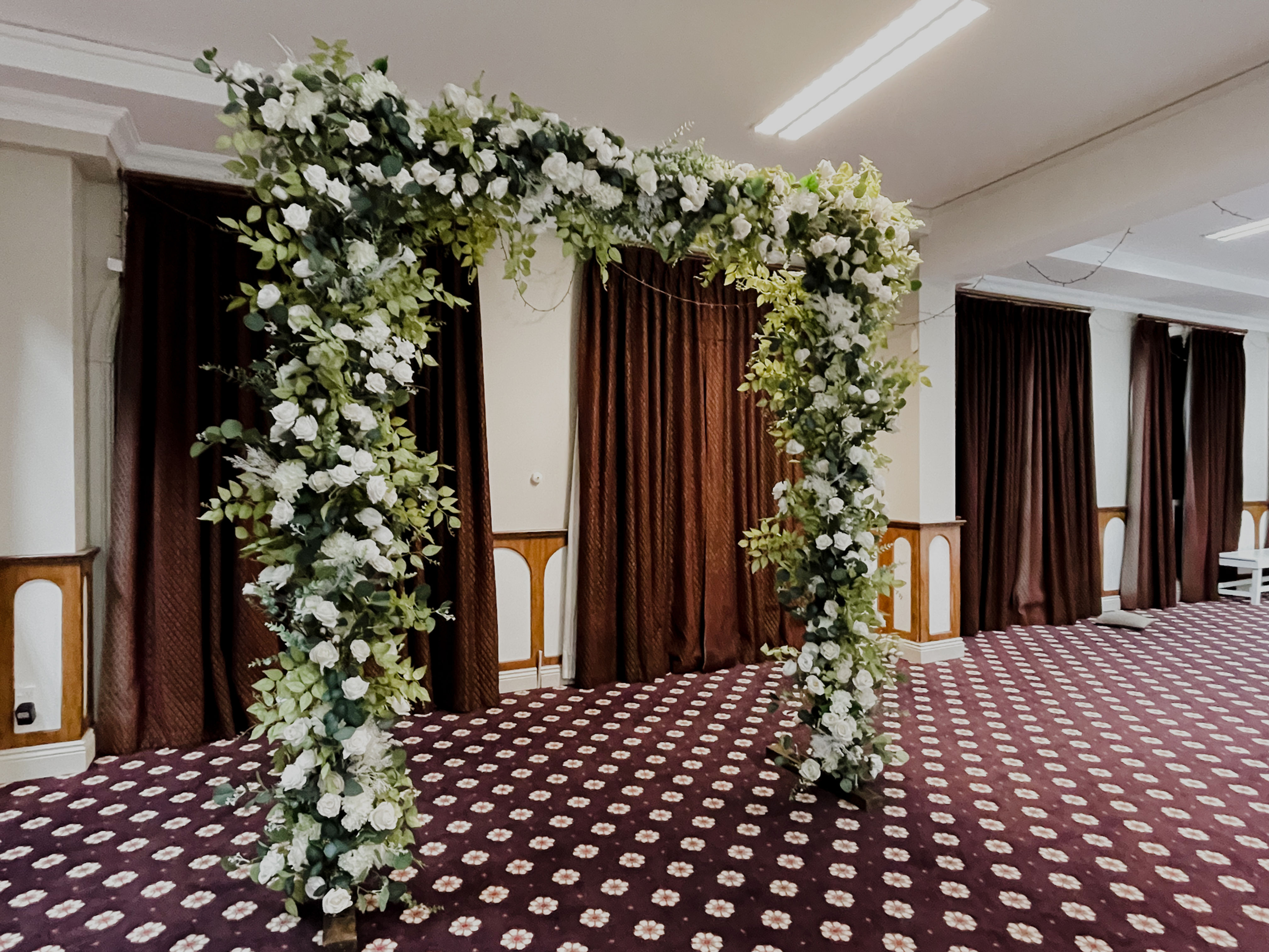 arch with fully covered floral design