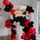 Thumbnail: Plinth with garland / red and black theme
