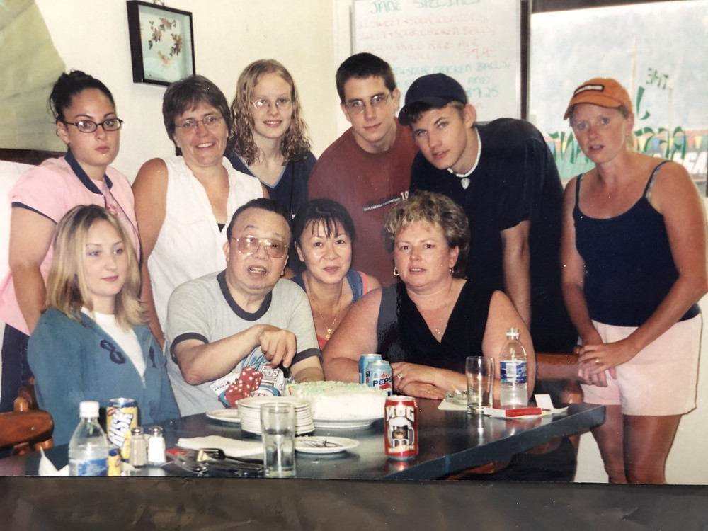 Joe Wong celebrating his 70th birthday with his staff, friends, and family. This was the first year of the Jade Restaurant in Manitouwadge.