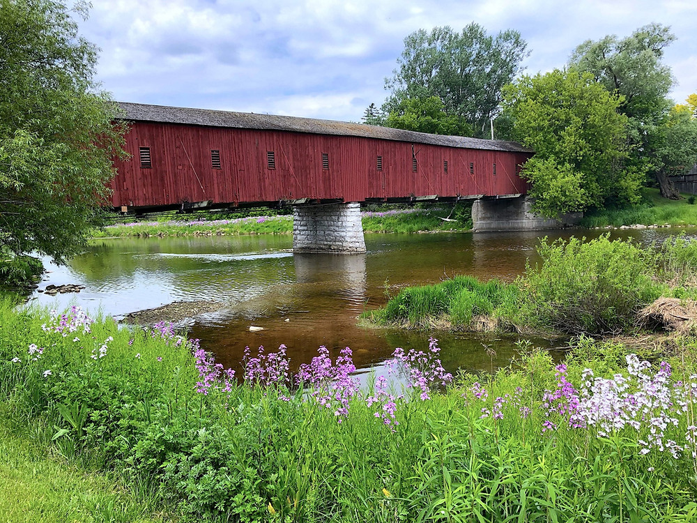 The Kissing Bridge can be seen on a short trail detour at West Montrose, Ontario. Credit: Diana Ballon & G2G Rail Trail Inc.