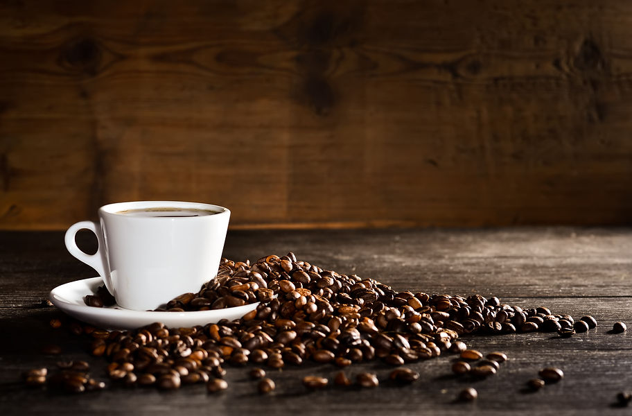 cup-coffee-with-pile-coffee-beans.jpg