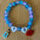 Thumbnail: TS Guitar Red Lip Friendship Bracelet