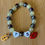 Thumbnail: TS Guitar Red Lip Friendship Bracelet