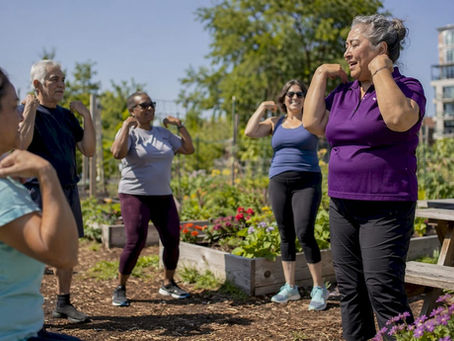Community health worker leading bone health exercises