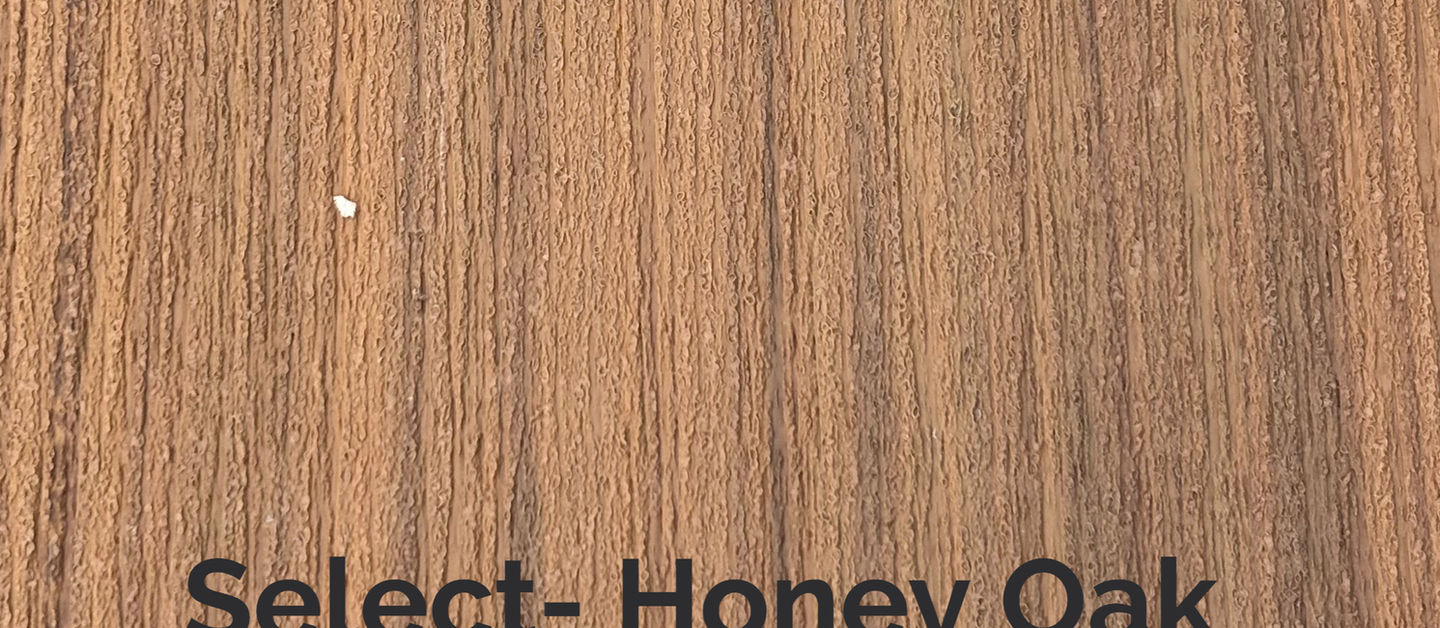 Select Honey Oak composite decking board with warm oak-tone woodgrain and moisture-resistant mineral-based construction