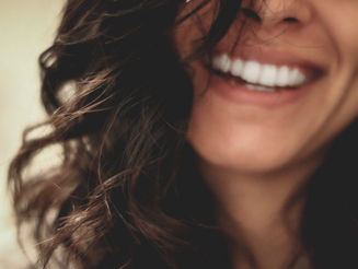 Não passe um batom, passe um sorriso