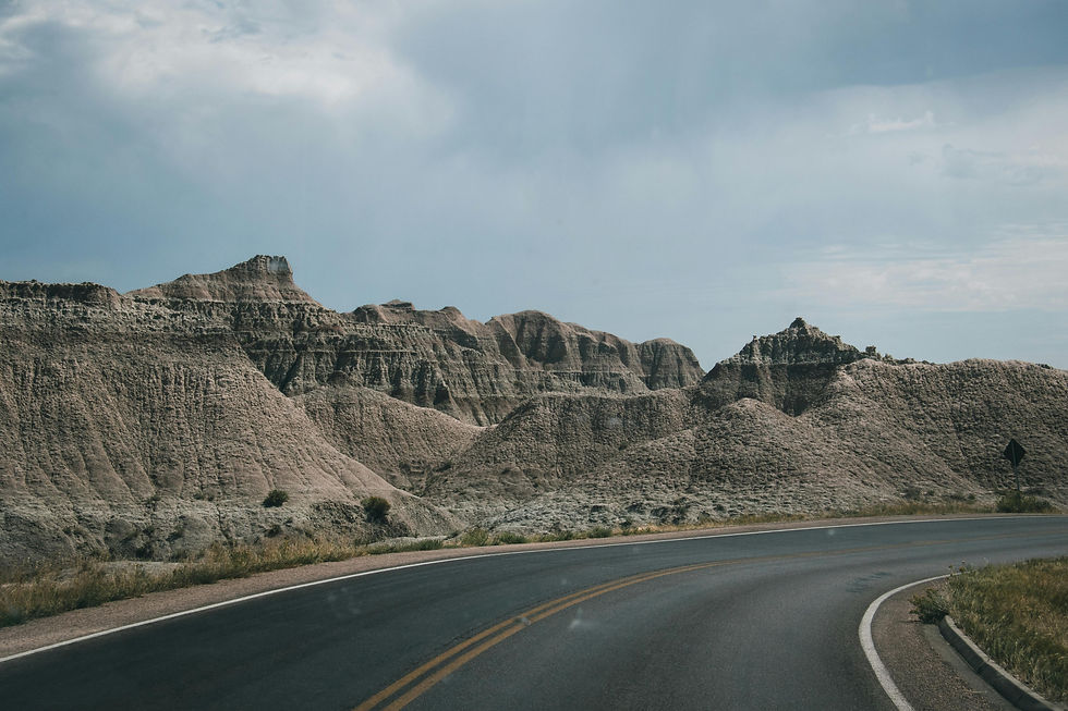 Scenic highway winding through badlands landscape