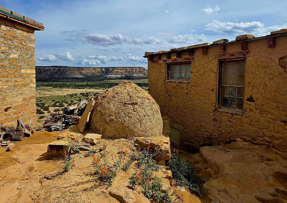 Traditional adobe dwellings and horno oven in the Southwest