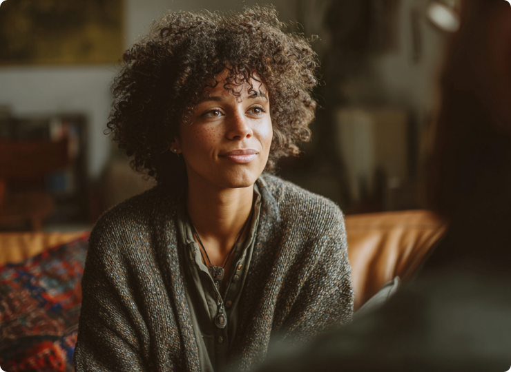 A woman actively listens when talking to a loved one about their addiction.