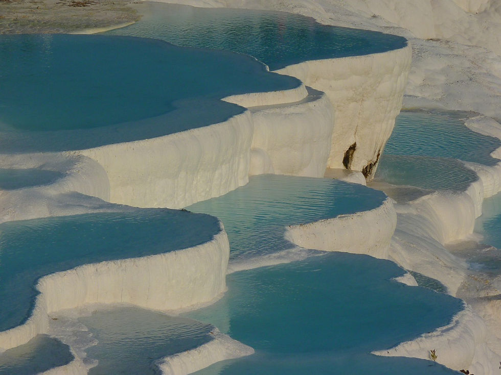 Pamukkale & Hierapolis – natural wonder meets ancient spa city.