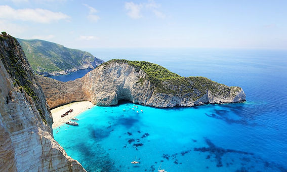 Navagio Beach (Shipwreck Beach) Zakynthos Greece with turquoise water, white cliffs, and s
