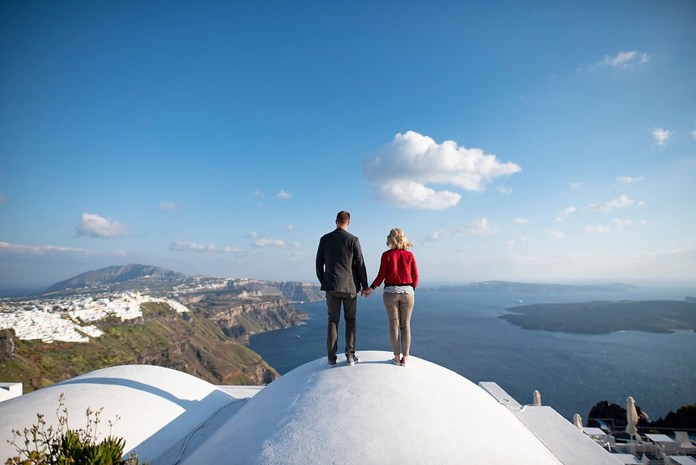Couple enjoying Santorini caldera view – first time to Greece travel tips