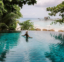 woman on body of water during daytime_ed