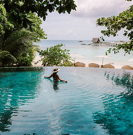 woman on body of water during daytime_ed