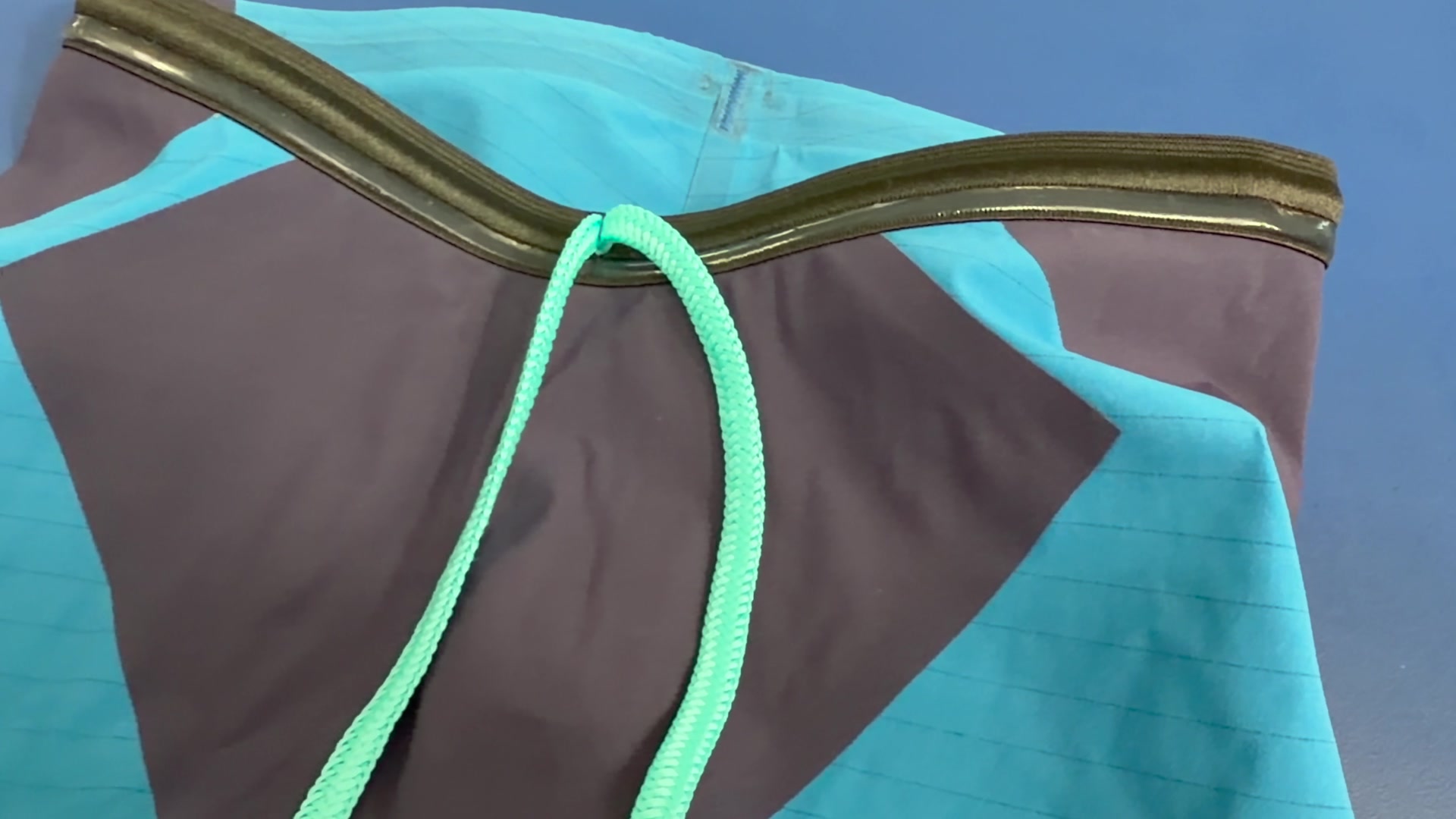 Arena Air 3 waistband, bonded edge and drawcord detail in Blue Cosmo
