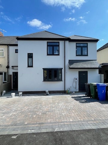 Modern white EcoRend silicone system applied to a Sheffield home by Plaster & Rendering Solutions.